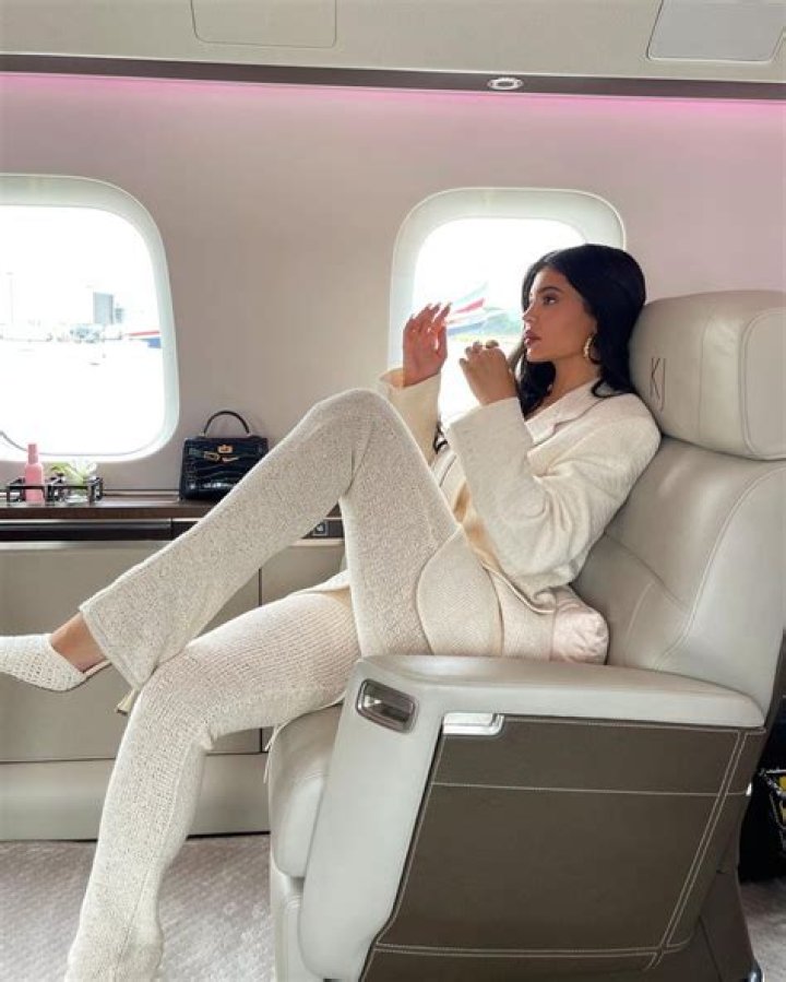 Does Kylie own her own plane?