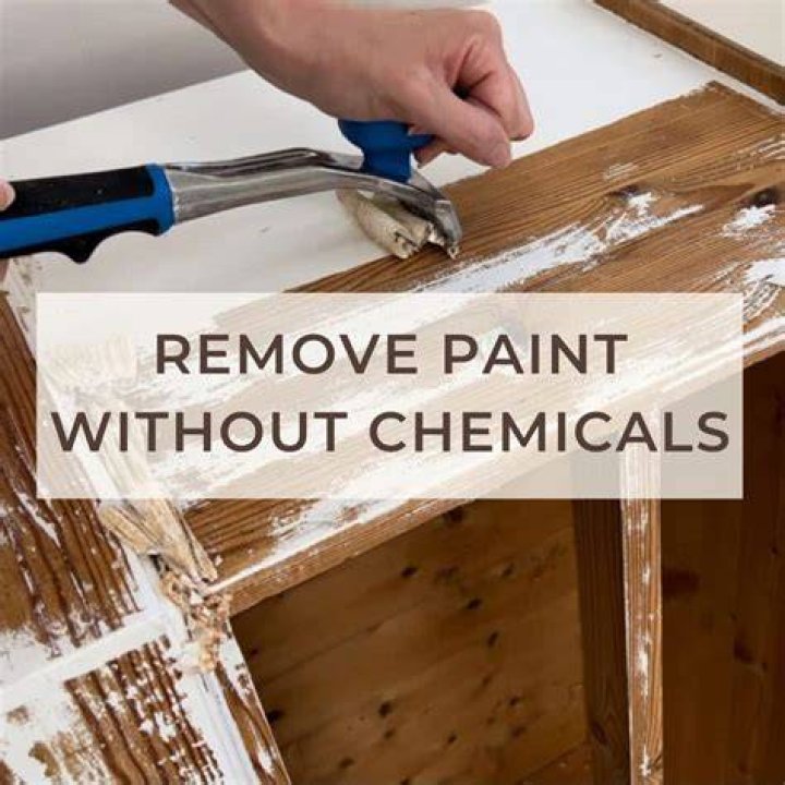 How do you remove oil-based paint from wood cabinets?