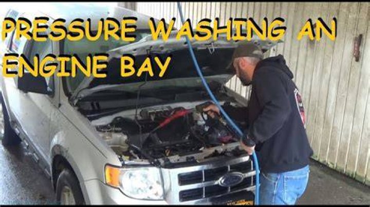 Is it safe to power wash a car engine?