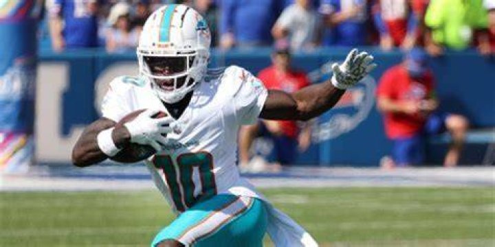 Who is the fastest man ever to play in the NFL?