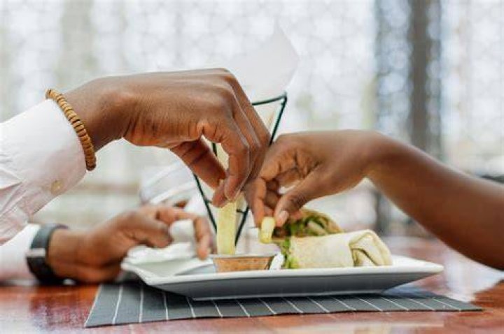 Why do Africans eat with their hands?