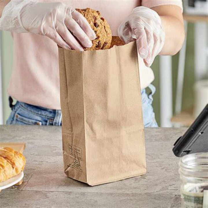 Will a brown paper bag keep carpenter bees away?